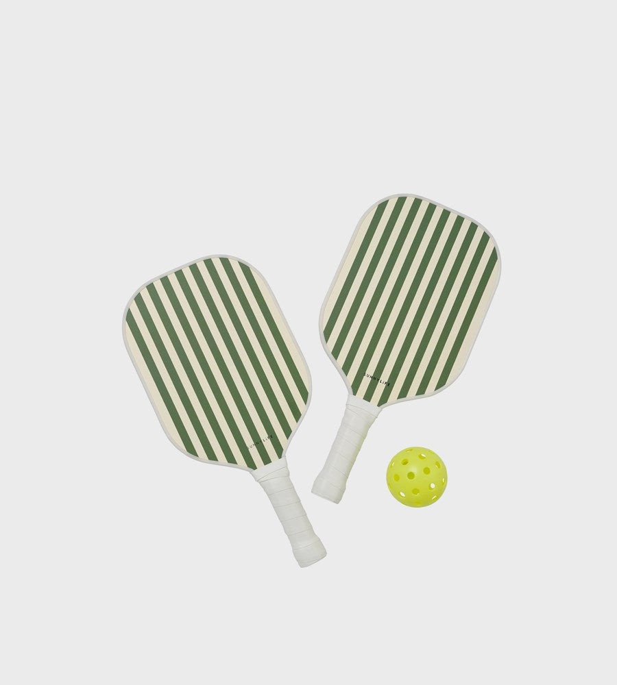 Two green and white striped pickleball paddles with a yellow pickleball on a light gray background