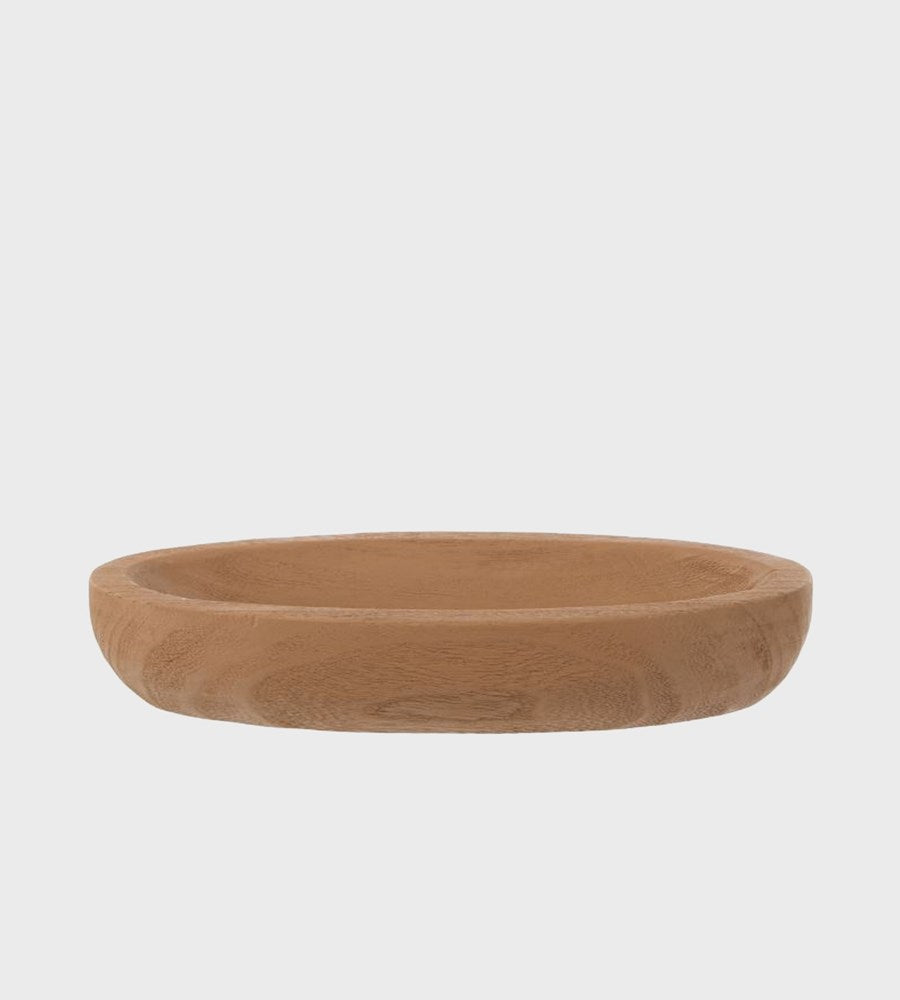 Wooden bowl on a light gray background