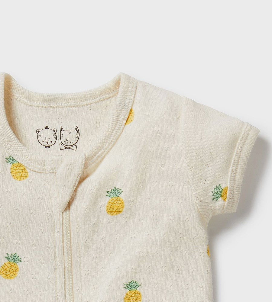 Baby romper with pineapple patterns on a white background