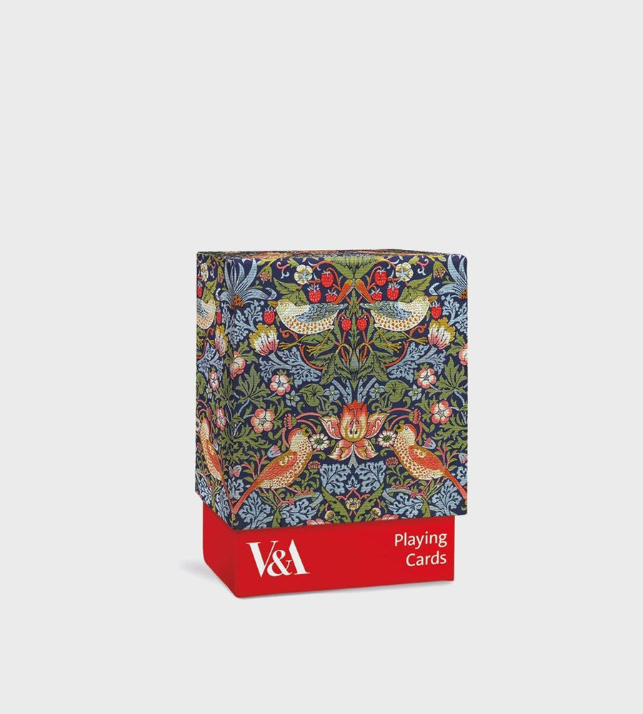 Playing card box with floral and bird design on a white background