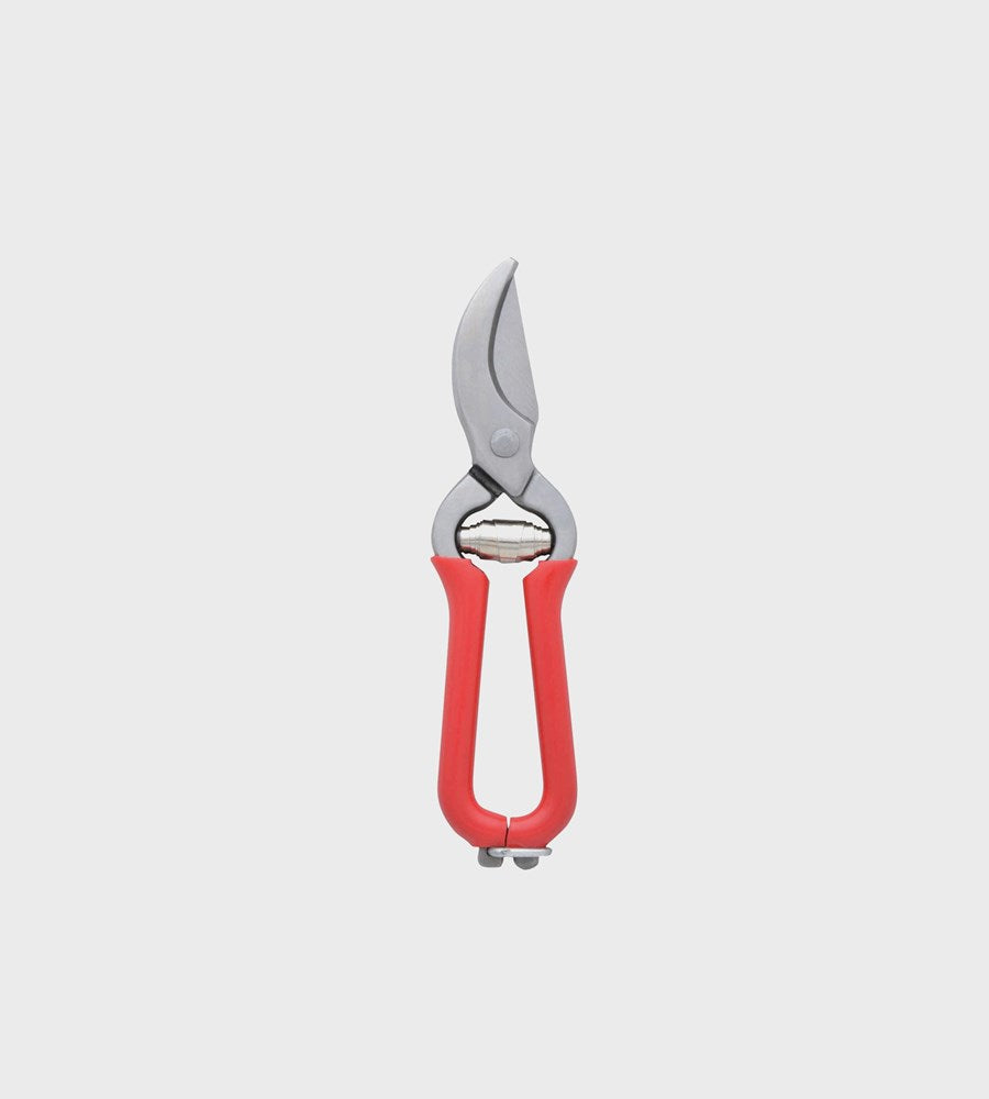 Pruning shears with red handles on a light gray background