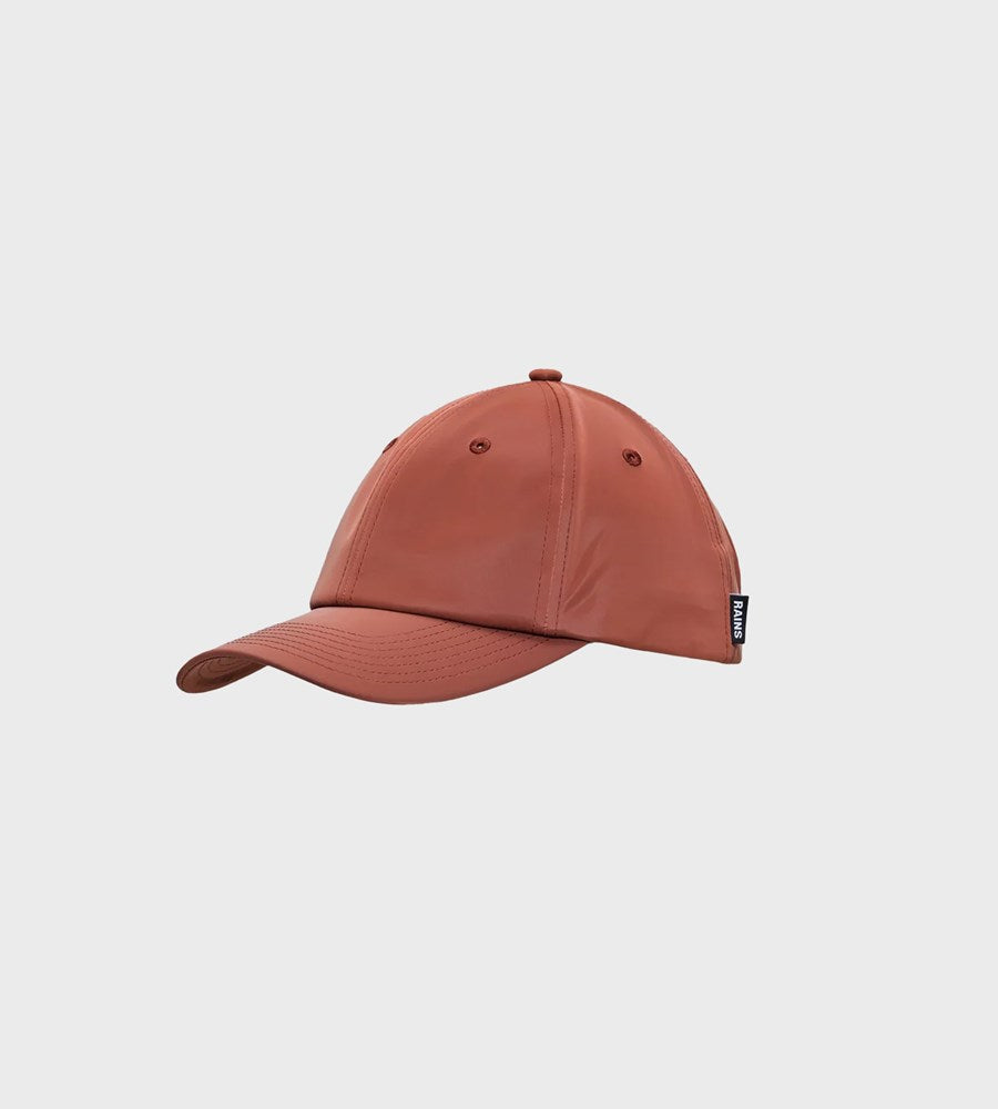 Brown baseball cap on a light gray background