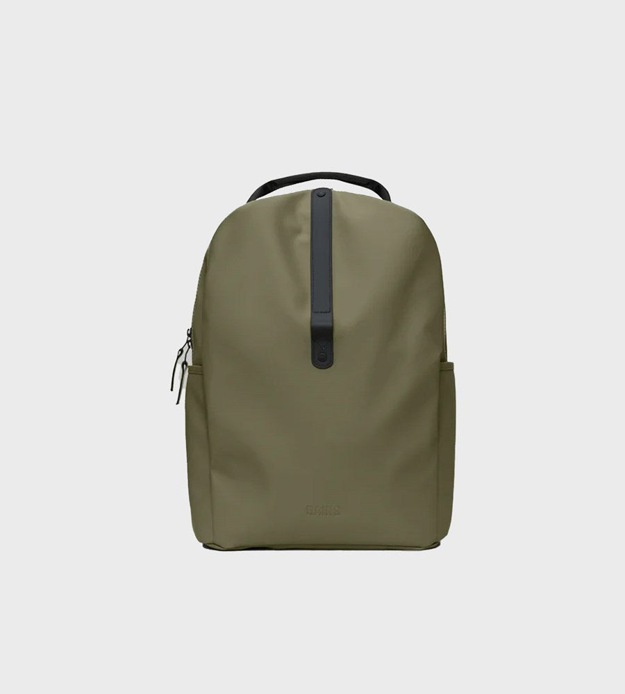 Green backpack on a light gray background
