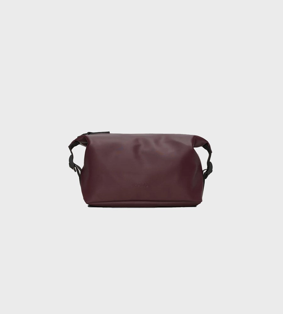 Brown leather bag on a light gray background