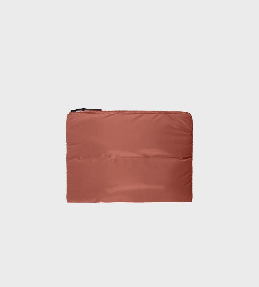 Brown pouch on a white background