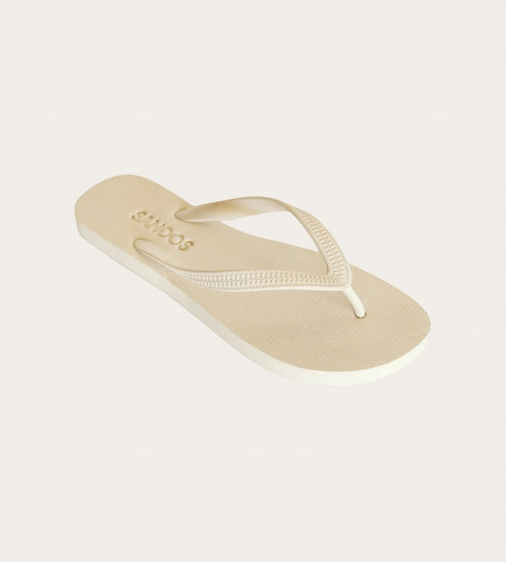 Beige sandal with 'SANDAL' logo on a light gray background