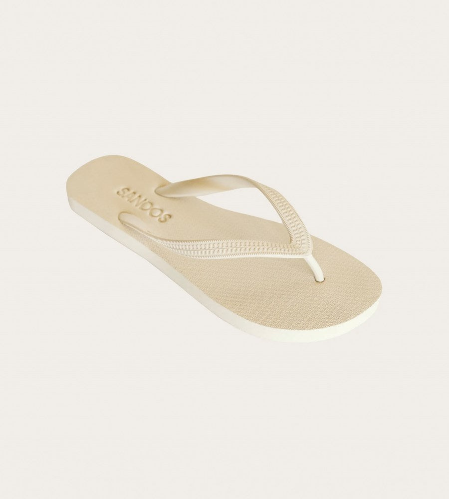 Beige sandal with 'SANDAL' logo on a light gray background
