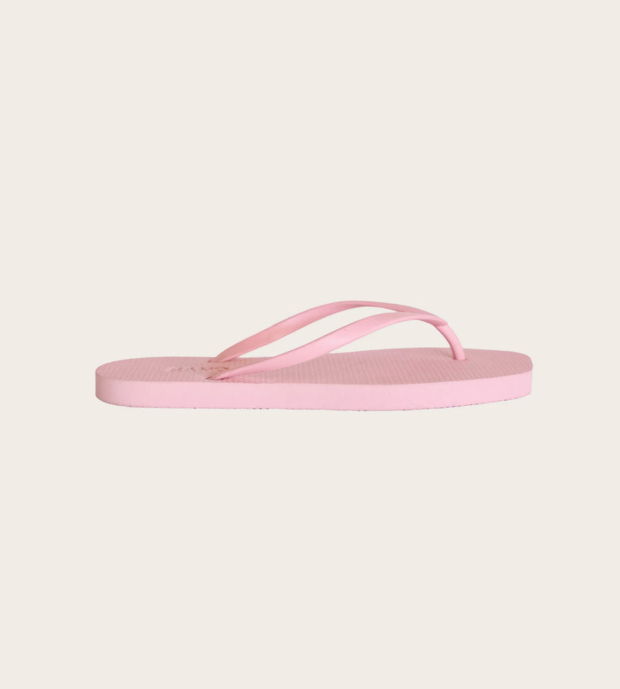 Pink flip-flop sandal on a light pink background
