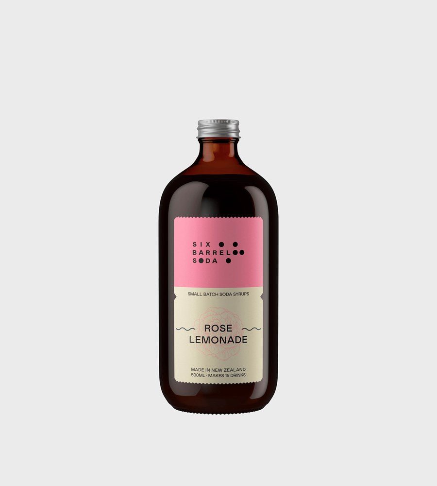 Six Barrel Soda bottle of Rose Lemonade on a light gray background