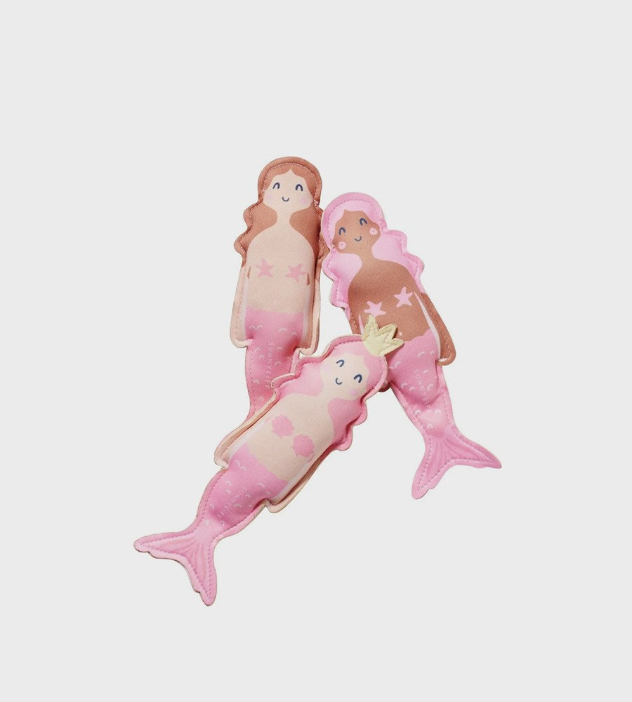 Two pink mermaid plush toys on a light gray background