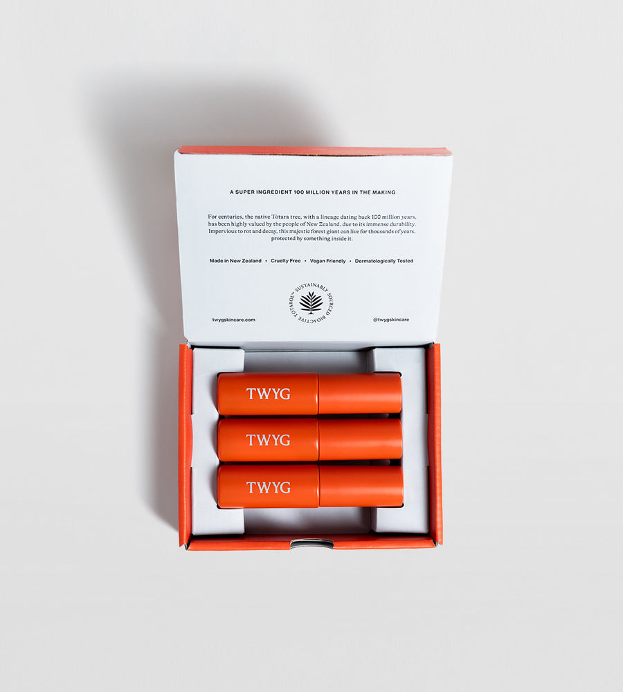 Orange TWYG packaging with a white label on a light gray background