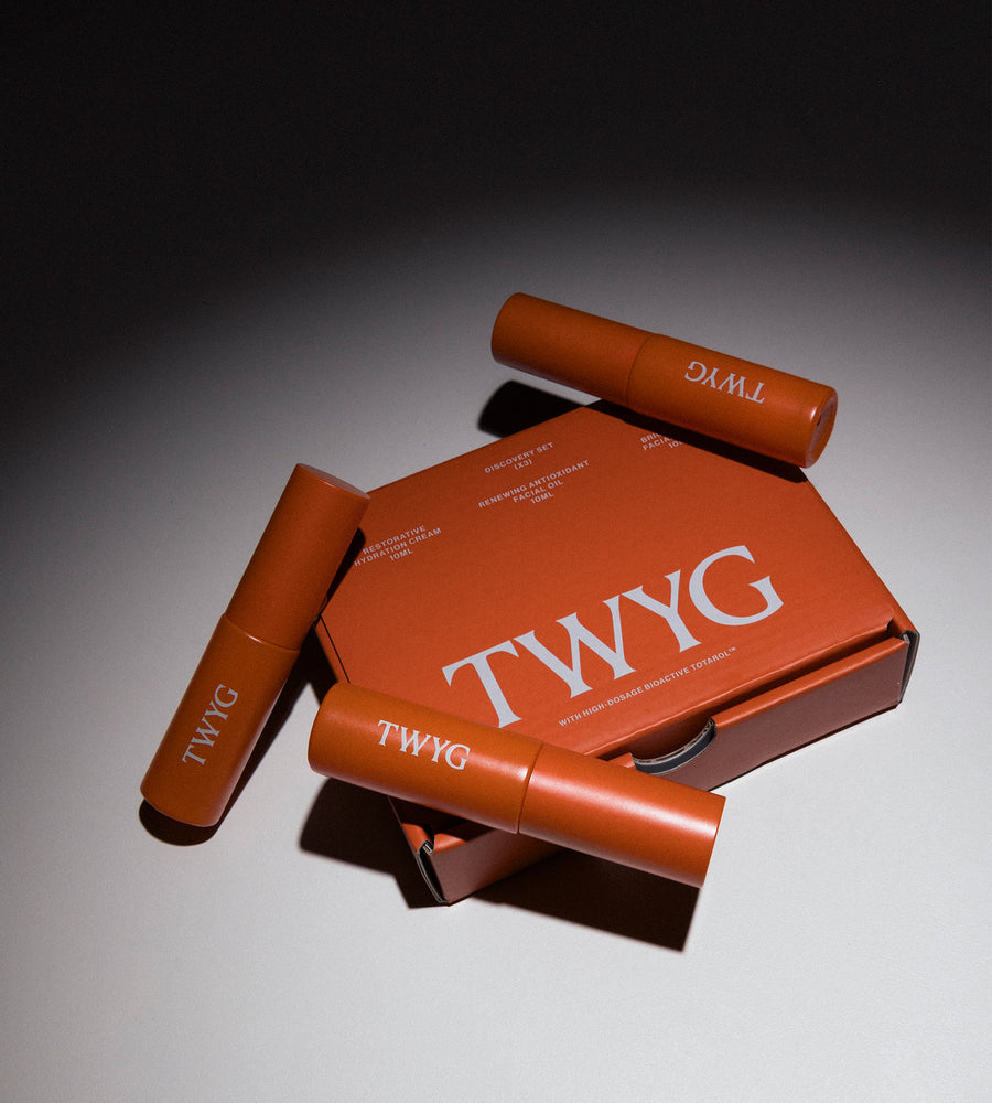 TWYG products with packaging on a gradient background