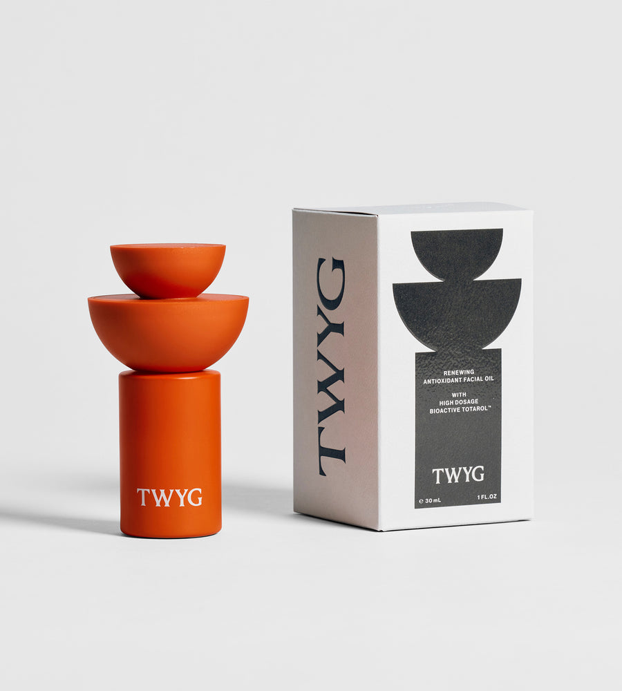 Orange TWYG product with packaging on a light gray background