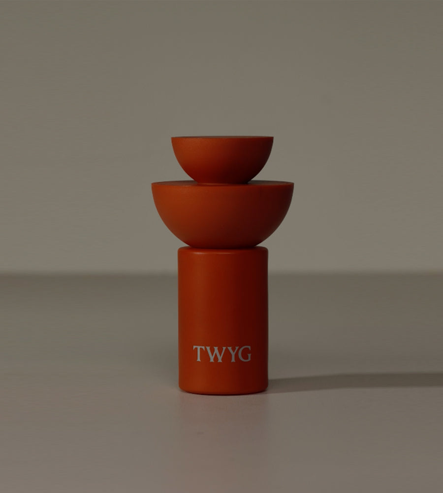 orange 'TWYG' branding on a gray background