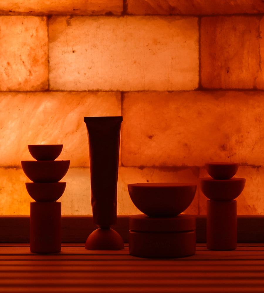 TWYG Products lined up against orange background
