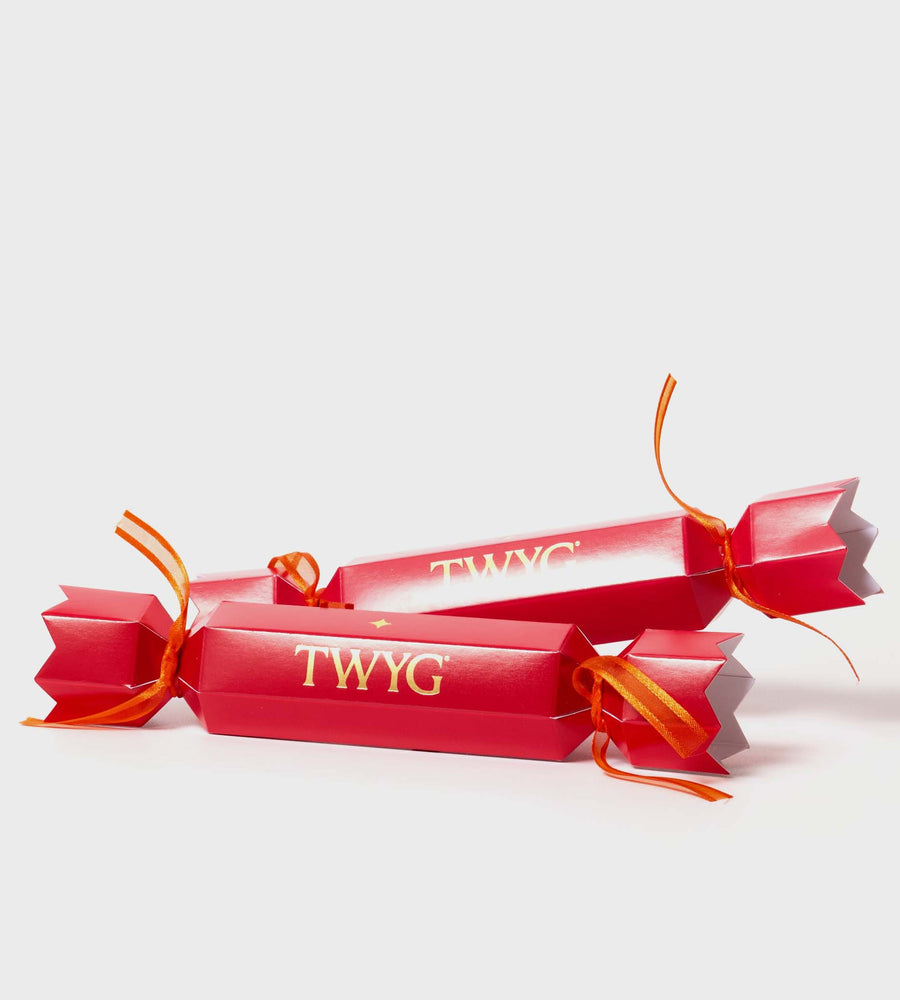 Red cracker-shaped products with 'TWYG' branding on a white background