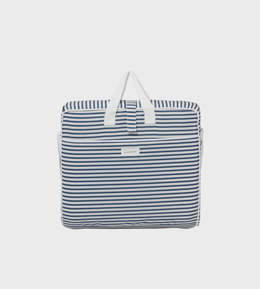 Blue and white striped tote bag on a light gray background