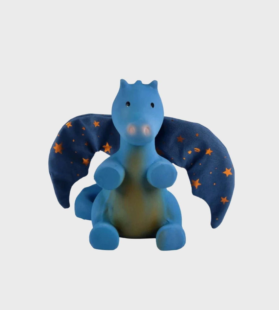 Blue dragon toy with star-patterned wings on a light gray background