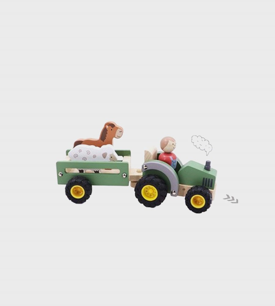 Toy tractor with a trailer carrying two animals on a light gray background