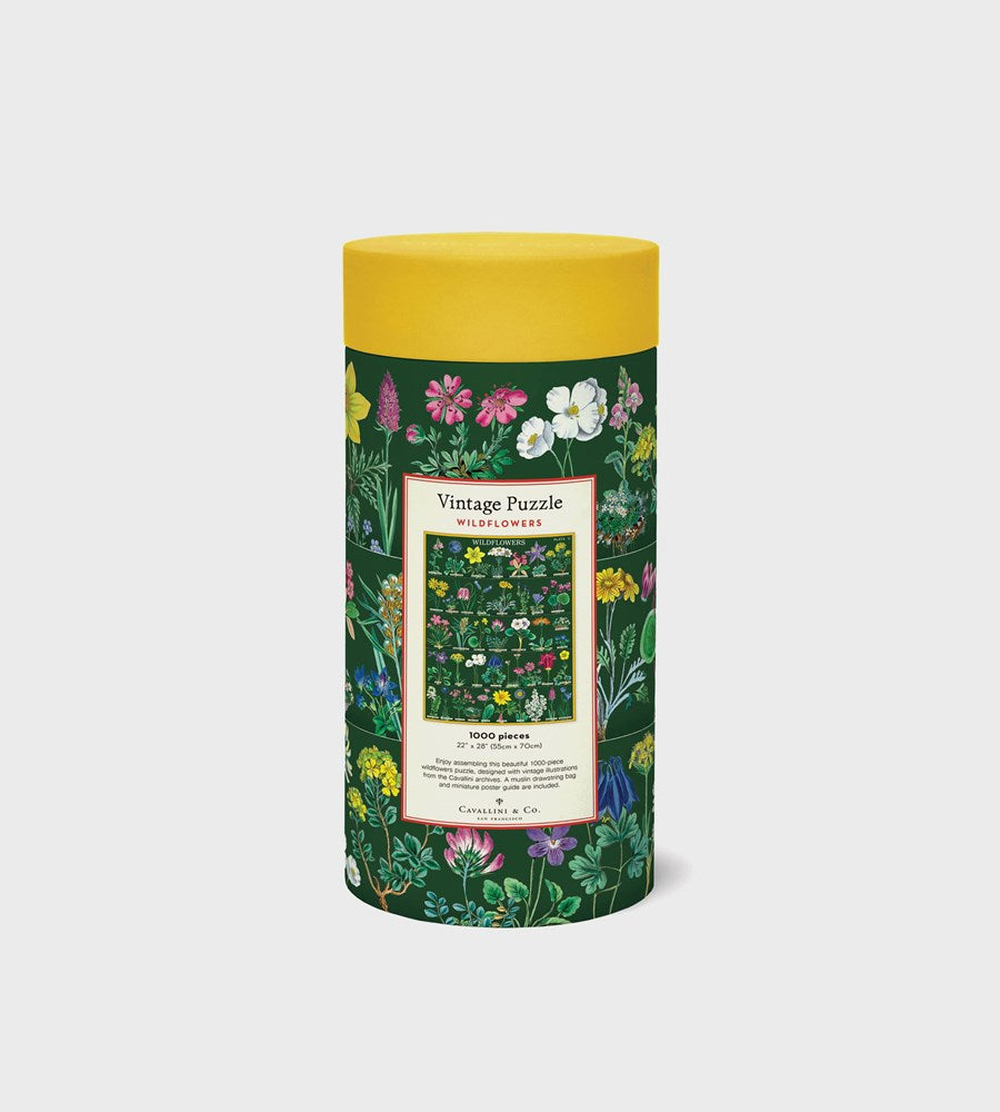 Floral-patterned cylindrical puzzle box on a white background