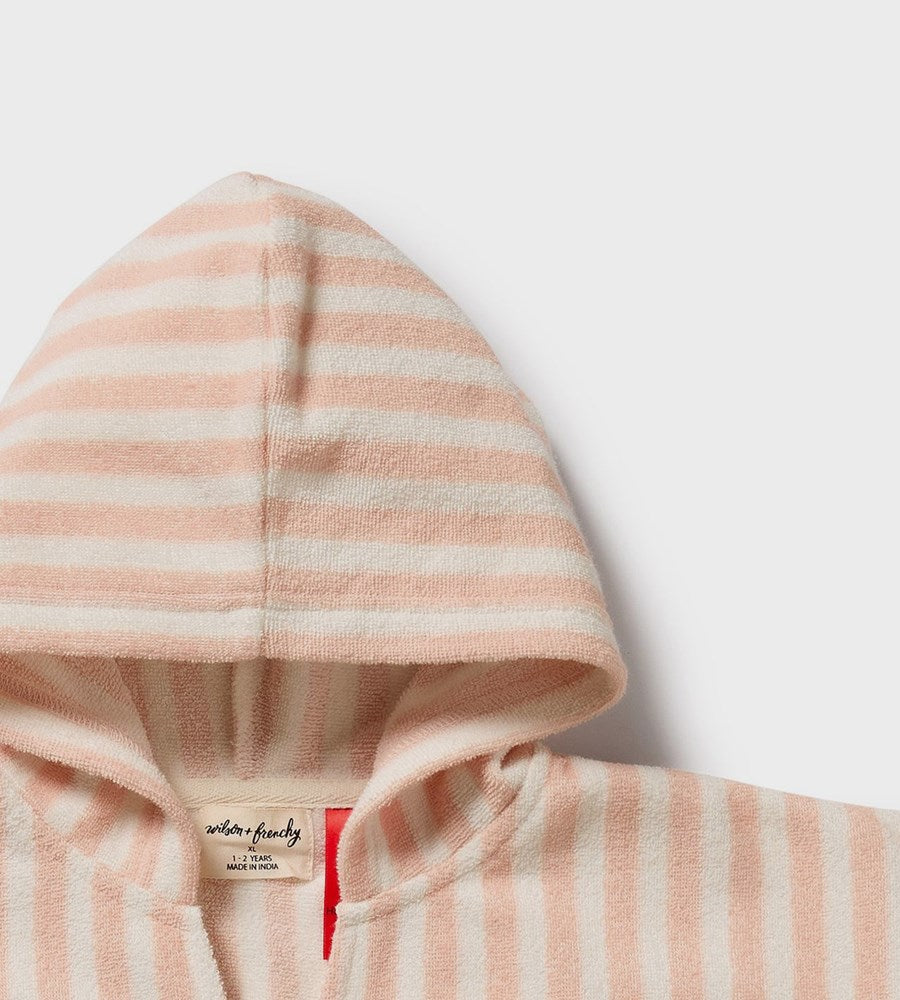 Pink and white striped baby robe with hood on a light gray background