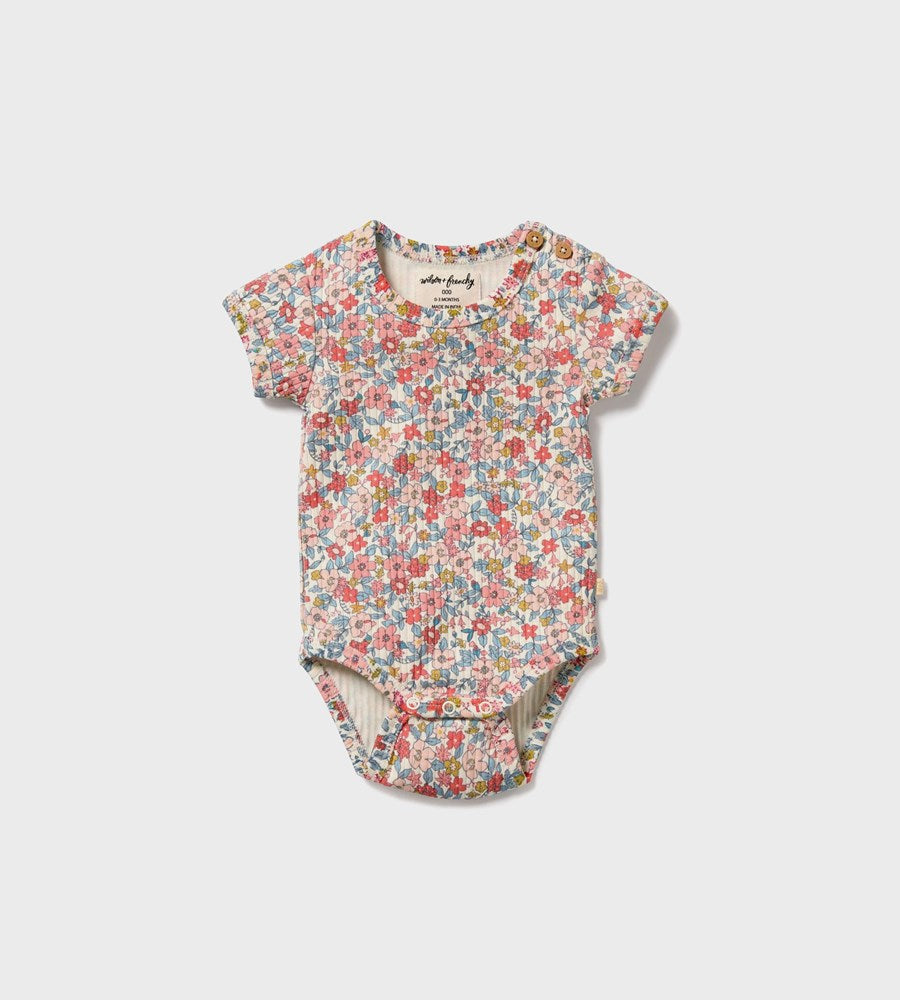 Floral baby bodysuit on a white background