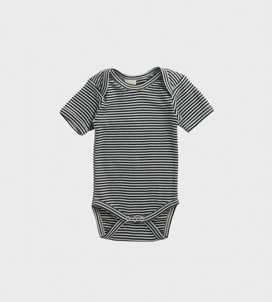 Striped baby bodysuit on a light gray background