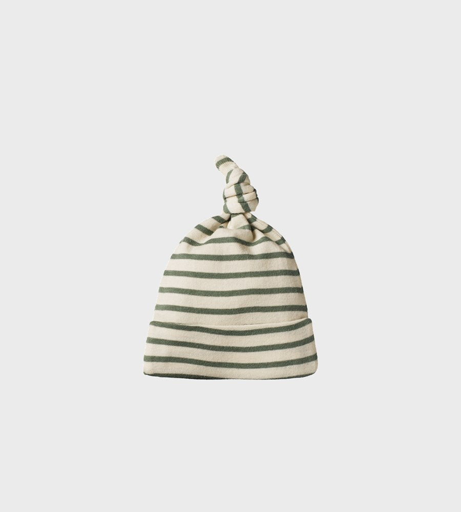 Striped baby hat on a light gray background