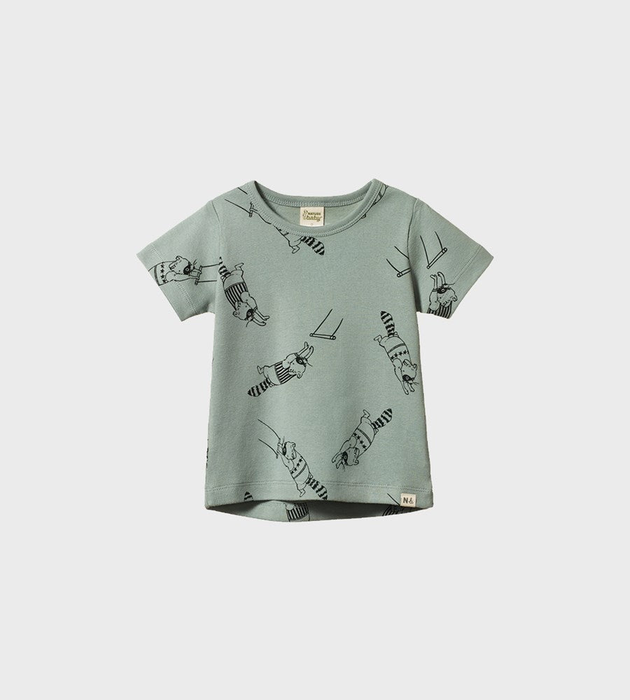 Green t-shirt with animal prints on a white background