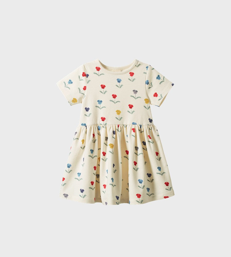 Children's dress with floral pattern on a white background