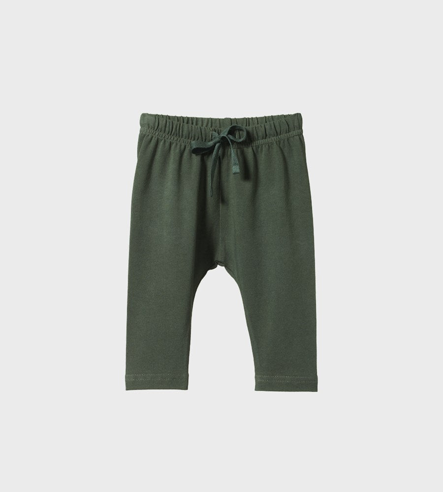 Green baby pants on a white background
