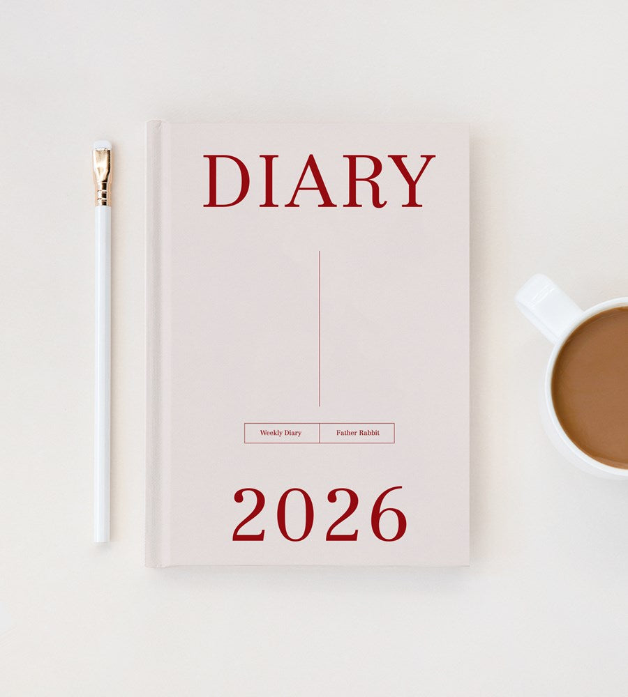 2026 diary with a pen and cup of coffee on a light background