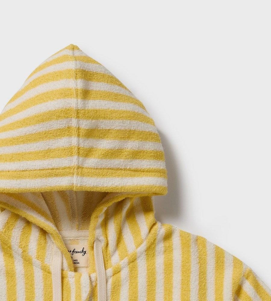 Yellow and white striped hooded garment on a light gray background