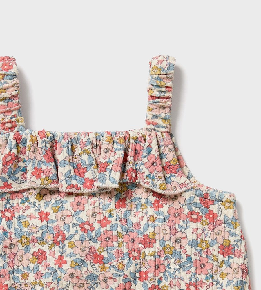 Floral dress with ruffled trim on a white background