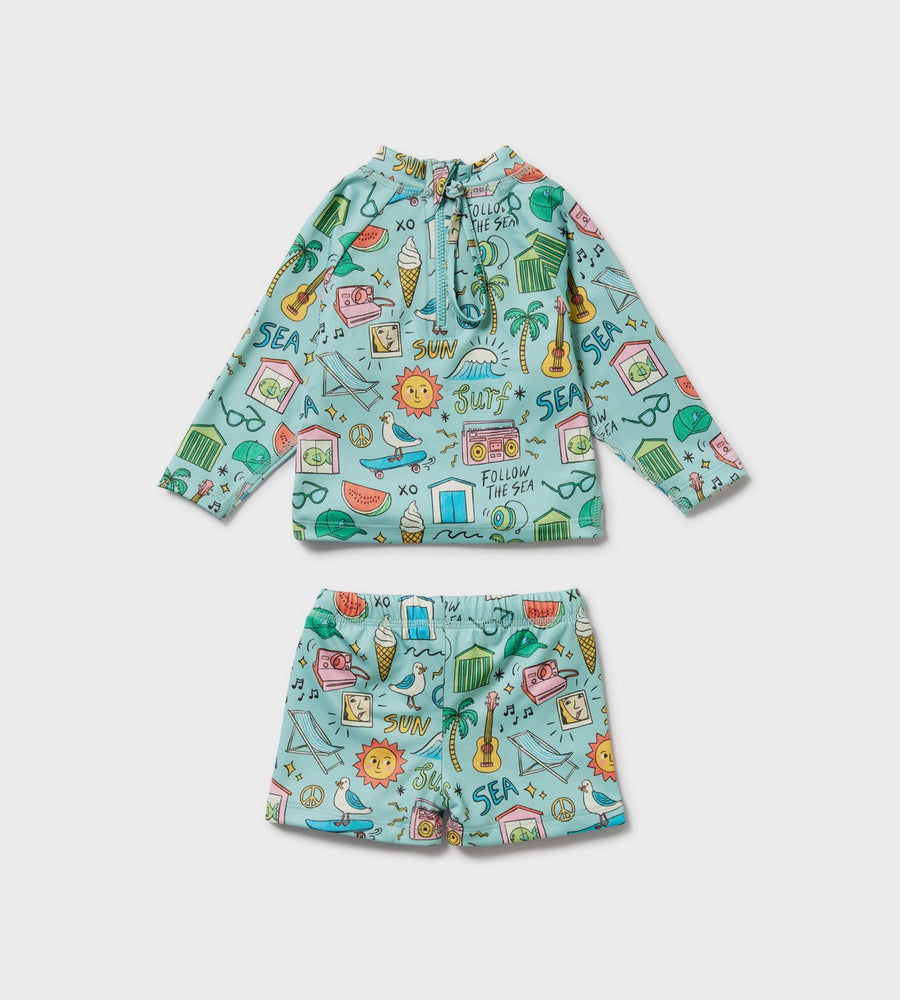 Children's hoodie and shorts set with a colorful pattern on a light gray background